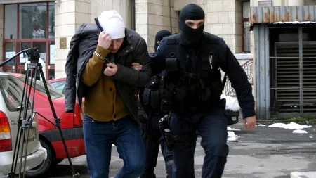 DIICOT: Peste 20 de persoane au fost reținute în cazul privind falsificarea de carduri