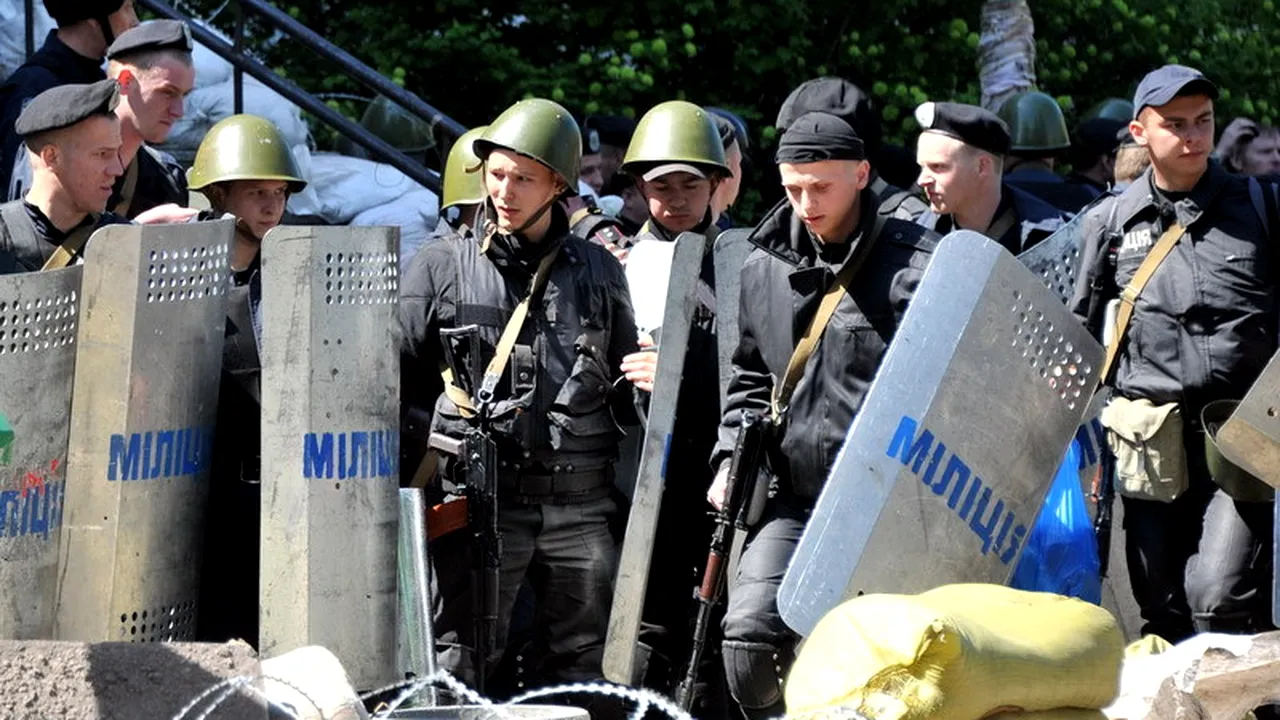 CRIZA DIN UCRAINA. Douăzeci de rebeli și un polițist, uciși la Mariupol