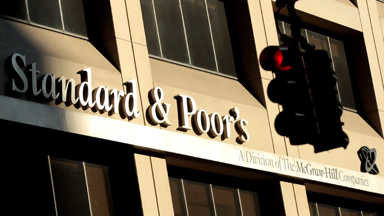 S&P a retrogradat 11 bănci spaniole în urma reducerii ratingului de țară