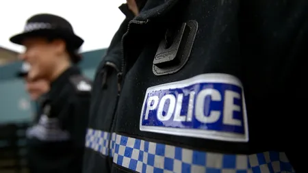 Trei români suspectați de trafic de persoane către Marea Britanie, arestați