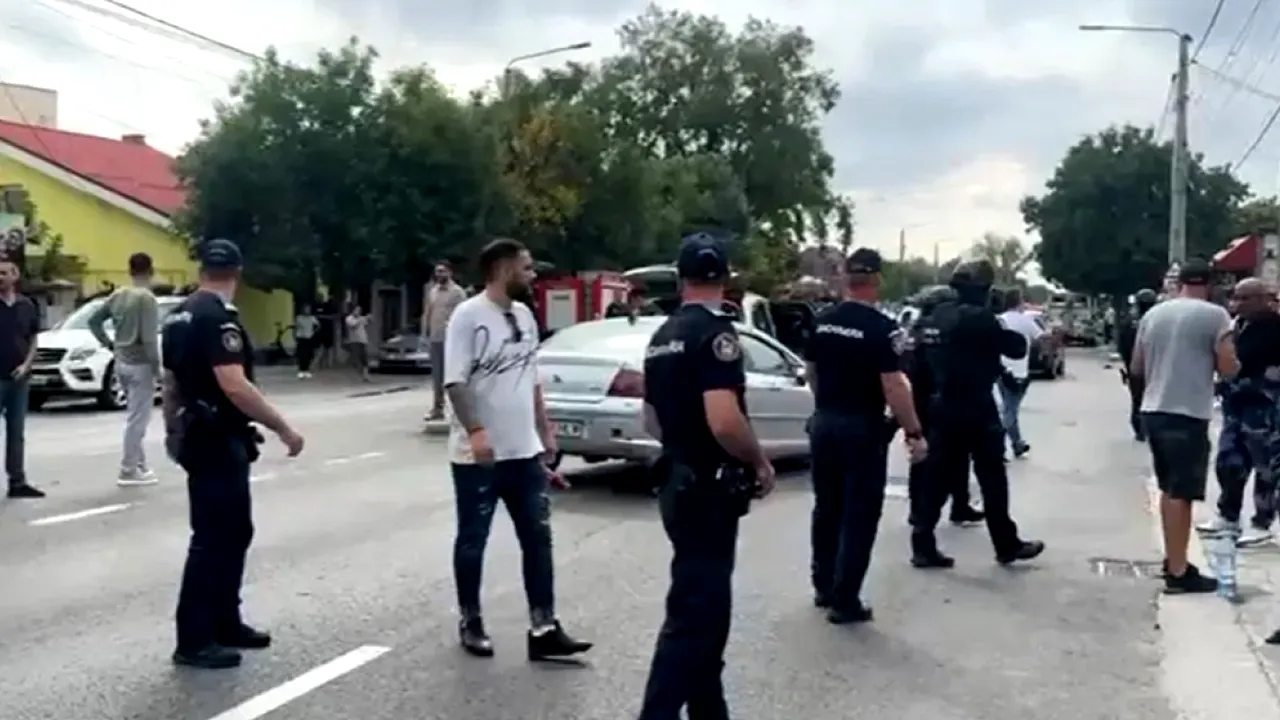 Înmormântare de maximă siguranță la Craiova. Rudele interlopului ucis în urma războiului dintre clanuri vin din arest direct la slujbă