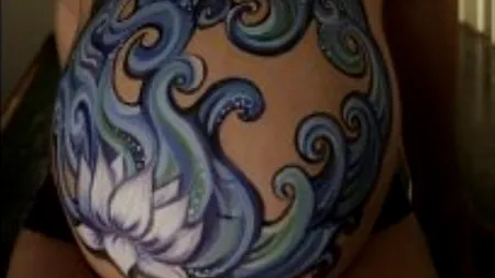 GALERIE FOTO. Cum poate deveni burta unei femei însărcinate o operă de artă