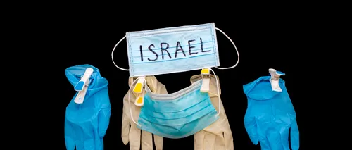 Israelul a reintrodus măsura purtării măştii de protecţie în unele zone