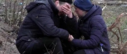 „Frate, te căutăm de atâta vreme” Ucrainenii își plâng morții pe marginea gropii comune din Bucea, vizibilă din satelit