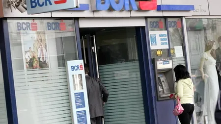 Moody's a coborât ratingurile BCR și Raiffeisen Bank la 