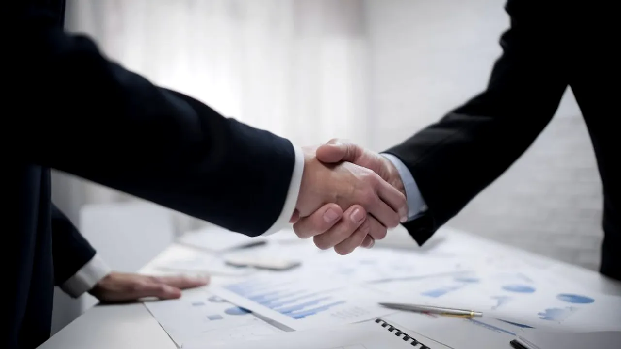 Pandemia a schimbat piața fuziunilor și achizițiilor. În ce domenii vom vedea tranzacții în 2021?