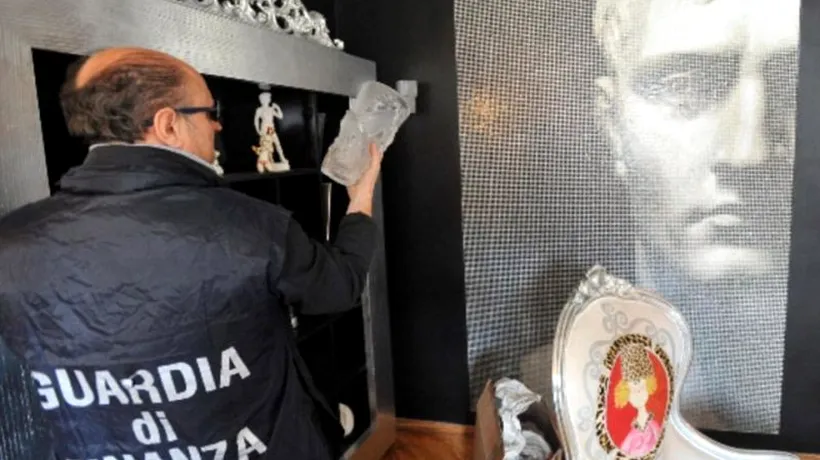 GALERIE FOTO: Ce a găsit poliția în casa unui mafiot italian