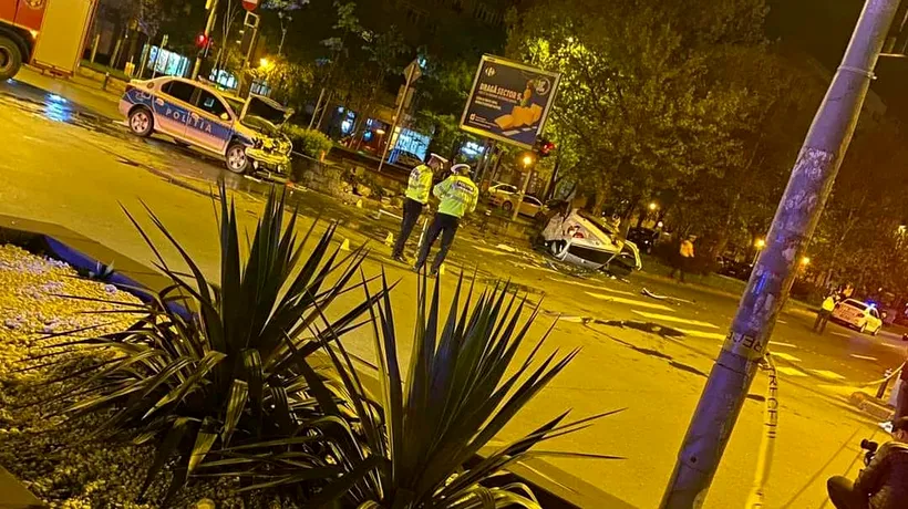 BMW spulberat de o mașină a Poliției, în București. Patru persoane au ajuns la SPITAL