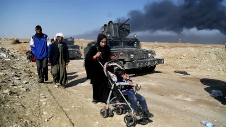 Masacru la Mosul cu autor neclar - SUA sau Statul Islamic. Peste 100 de civili au murit în urma unui bombardament