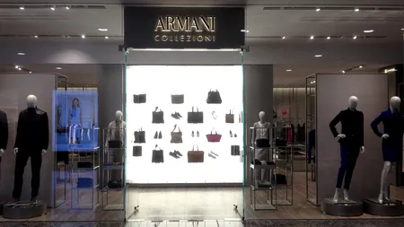 Probleme pentru Giorgio Armani: dispar branduri celebre și se închid magazine