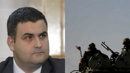 Gabriel LEȘ își verifică telefonul, în timp ce militarii întorși din Afganistan îi DAU ONORUL