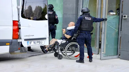 Omar HAYSSAM, păzit de mascați, cu mitraliere, la o clinică. Teroristul, ajuns în scaun cu rotile, speră să scape de închisoare