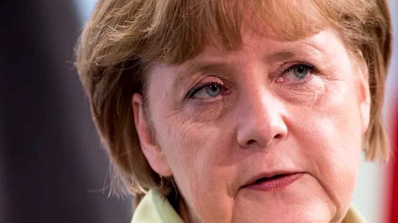 Merkel: Germania susține propunerea lui Draghi de a condiționa ajutorul din partea BCE