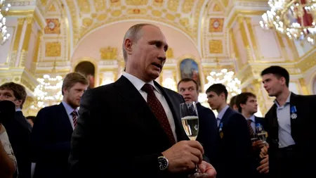 Putin îl ia pe 