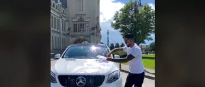 MOTIVUL pentru care un celebru influencer și-a spălat mașina de lux cu șampanie, în fața Palatului Culturii din Iași