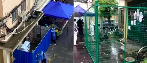 FOTO | Autoritățile din Shanghai montează garduri să țină oamenii în case