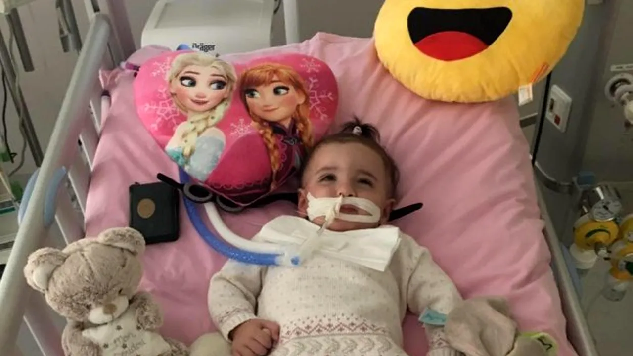 O fetiță și-a revenit din comă când urma să fie deconectată de la aparate