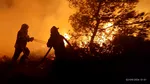 Misiune dificilă pentru pompierii români în Grecia. Au luptat toată noaptea cu incendiile de vegetație care amenințau localități din Attica