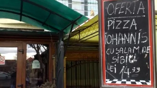 Pizza Iohannis cu salam de Sibiu, vândută la Cluj. Cât costă patru bucăți