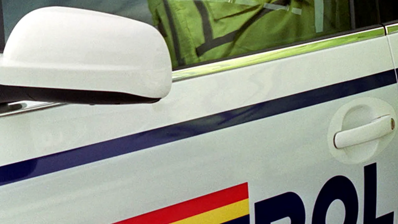 Polițist care i-ar fi oferit o carabină liderului unei grupări interlope, audiat la DIICOT