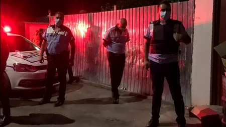 Două clanuri s-au măcelărit chiar în apropierea unei secții de poliție din București. O femeie a fost împușcată