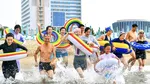 Cum își petrec nord-coreenii timpul la plajă. Presa de stat publică imagini rare cu oamenii în mega-stațiunea de suflet a lui Kim Jong-un