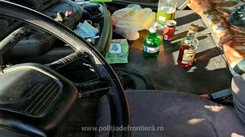Șofer de TIR, prins de polițiști în timp ce se „cinstea” de ziua lui la volan. Bărbatul bea coniac, energizant și bere