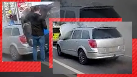 FOTO-VIDEO. O mașină a luat foc în timp ce stătea la semafor, pe unul dintre cele mai circulate bulevarde din București. „Adu o GĂLEATĂ de apă”