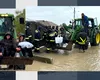 Evacuare cu excavatorul din puhoaiele din Prisăcani, Botoșani. Avertismente meteo în cascadă