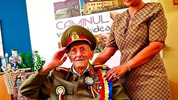 Controversa decorării veteranului de către Nicușor Dan de Ziua Națională. Aluzii din Rusia: România s-a vopsit în culorile nazismului