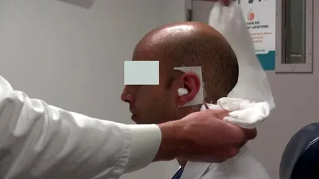 Scandal șocant la Iași. Un bărbat a ajuns la spital cu URECHEA ruptă și mestecată după un conflict cu un 