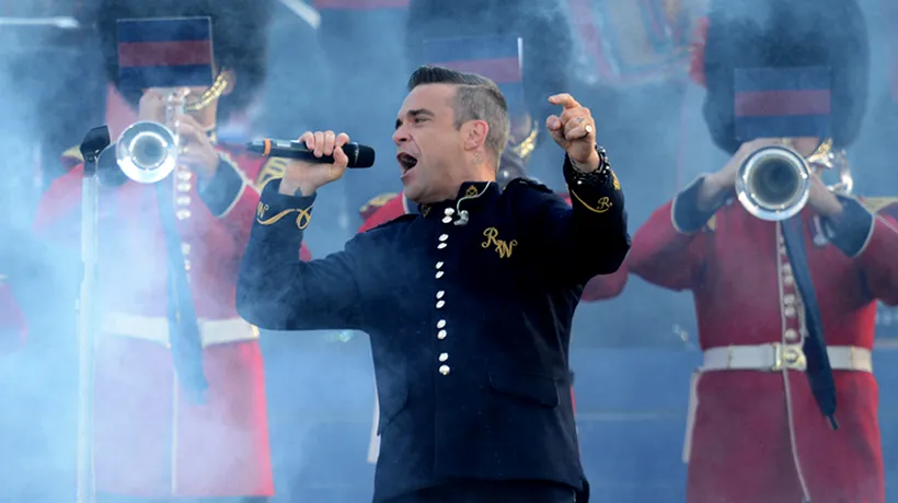 Gestul prin care Robbie Williams și-a șocat fanii. Ce a făcut la un concert. VIDEO