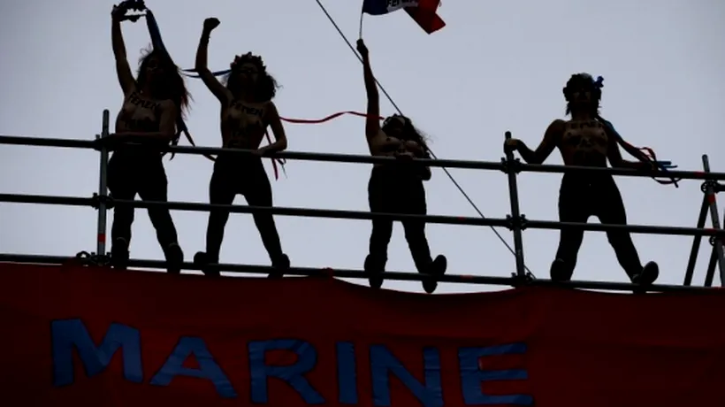 Protest în fața secției unde a votat Marine Le Pen. Mesajul afișat de Femen