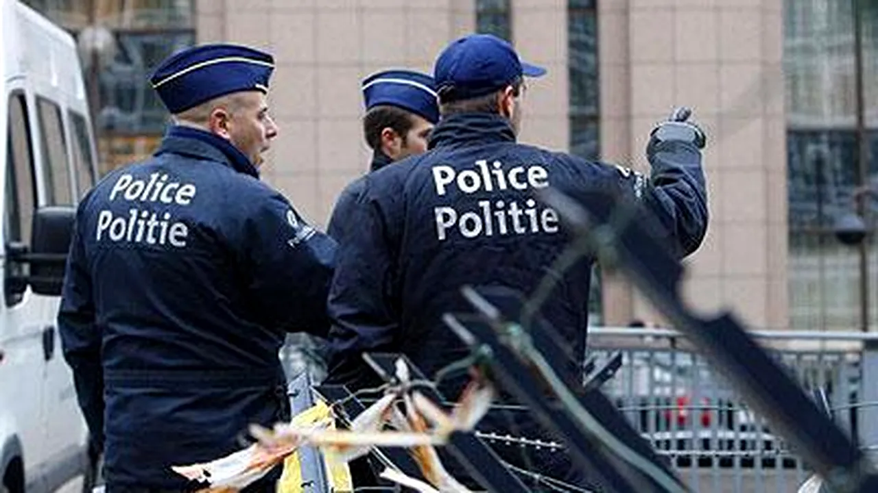 Un suspect arestat în Belgia în legătură cu atentatele de la Paris a fost inculpat pentru terorism