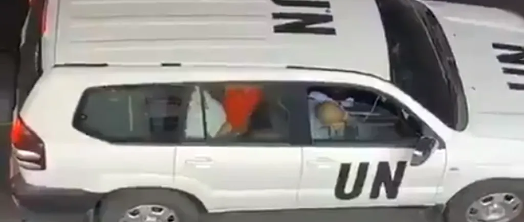 CONTROVERSE. Un cuplu, surprins întreținând relații intime în plin trafic, într-o mașină a ONU / Reacția organizației - VIDEO