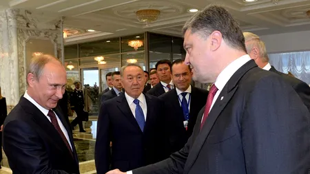 Vladimir Putin și Petro Poroșenko au convenit să continue dialogul în vederea păcii