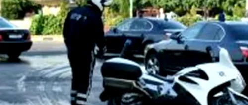 Incident la vizita lui Hollande: un polițist din coloana oficială a căzut de pe motocicletă