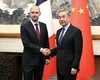 Ministrul francez de Externe discută cu omologul său chinez despre îmbunătățirea relațiilor COMERCIALE, în contextul tensiunilor globale