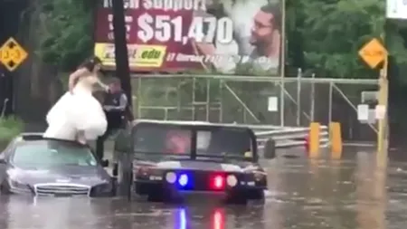 NUNTĂ CU PERIPEȚII în New Jersey. Mireasa s-a urcat pe capota mașinii pentru a se salva de VIITURĂ