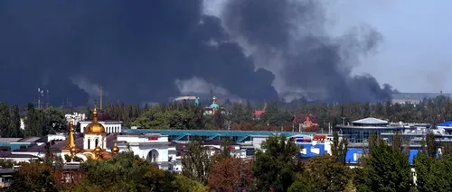 Cum arată pacea din Ucraina: tiruri de artilerie grea și o coloană imensă de fum în Donețk