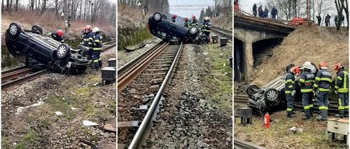 VIDEO | O mașină a căzut de pe un pod, la Predeal. Autoturismul a ajuns pe calea ferată