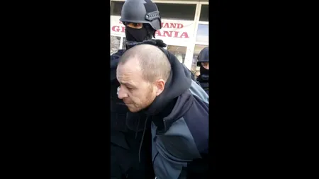 AREST. Un român urmărit internațional după ce a împuşcat doi marocani în Spania, prins în Hunedoara - VIDEO