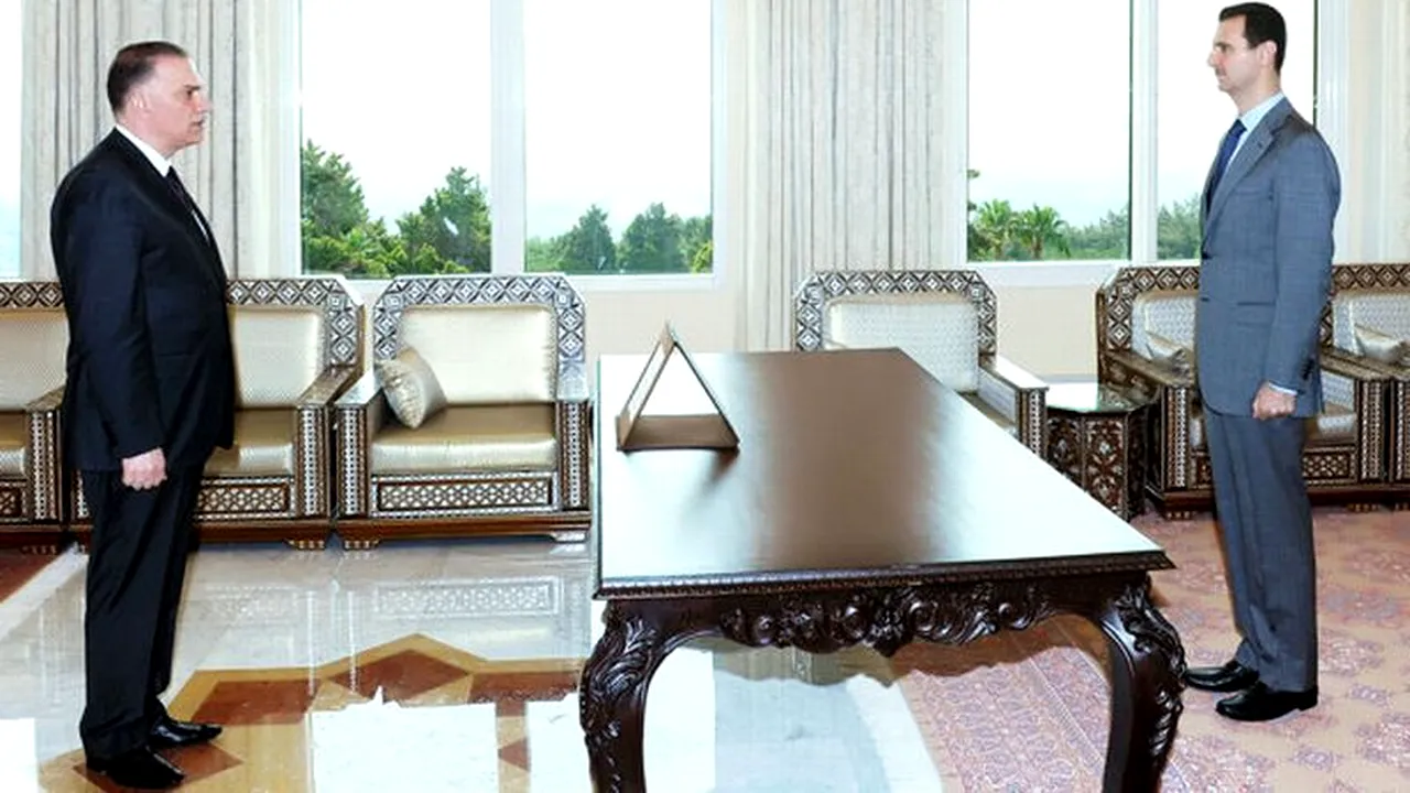 Ce este în neregulă cu această fotografie a președintelui Siriei