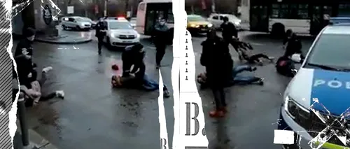 Scene ca în filme la Gara de Nord! Polițiștii „au dat de pământ” cu trei indivizi care consumau alcool pe stradă / VIDEO cu impact emoțional