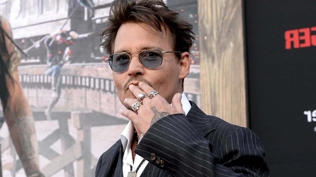 Johnny Depp s-a logodit cu Amber Heard