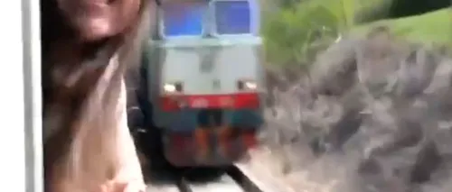 VIDEO ȘOCANT. La un pas de a fi DECAPITATĂ, după ce a scos capul pe geam în tren