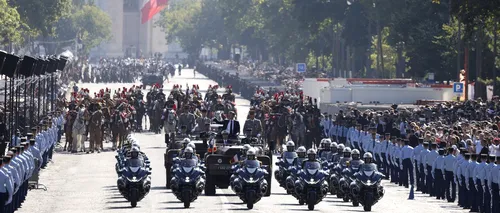 Macron aduce TORȚA OLIMPICĂ la parada de Ziua Națională a Franței, pentru a readuce speranța în inimile francezilor