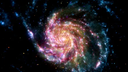 Imagine inedită a galaxiei M101. Câte telescoape au folosit cei de la NASA pentru a o realiza