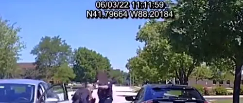 Videoclip viral în America! Un șofer sare din mașină cu un topor în mână și se îndreaptă spre un polițist