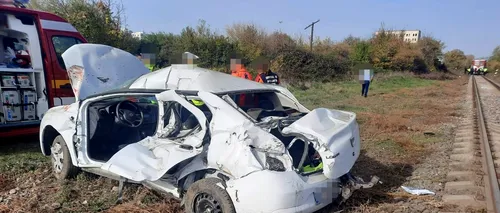 FOTO - Accident grav în Pitești: Doi oameni au murit striviți de un tren / Greșeala fatală făcută de șofer